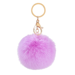 Detail of a purple fluffy faux fur pompom keychain with a gold metal lobster clasp