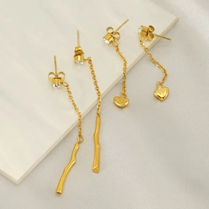 Elegant gold-plated stainless steel long tassel earrings with heart and twig pendants
