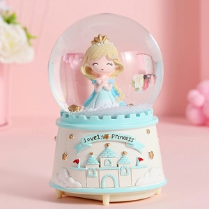Blue princess crystal ball music box with snow castle base and lovely princess text