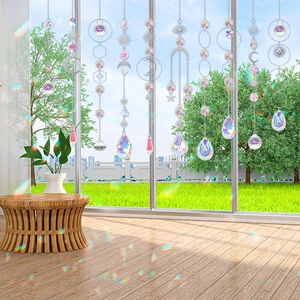 DIY Crystal Suncatcher set with moon and star pendants creating rainbow light on wood floor