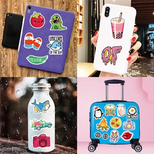 Waterproof VSCO aesthetic stickers pack shown on tablet, phone case, bottle and luggage