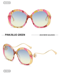 Detail of round mosaic sunglasses with wave-shaped gold temples and pearl accents