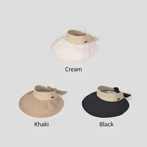 Women wide brim sun visor hats in beige, khaki and black with bow decoration
