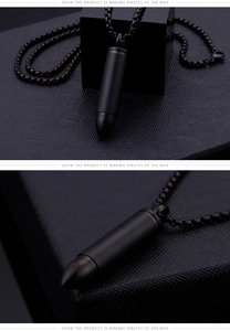 Three-angle views of a black stainless steel bullet pendant on a matching metal chain