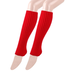 Detail of red ribbed knit leg warmers showing the texture and elastic cuff fit