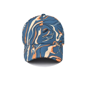 Abstract tie-dye baseball cap featuring blue and orange marble patterns for outdoor style