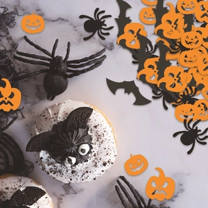 Confettis de fête Halloween avec citrouilles, chauves-souris et araignées pour décoration