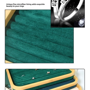 Detail of bamboo jewelry tray with dark green microfiber slots for ring storage