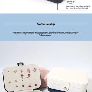 Detail of portable jewelry box with removable dividers for lipstick and bracelets
