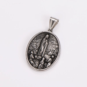 Detailed relief of Our Lady of Fatima on a silver oval stainless steel pendant