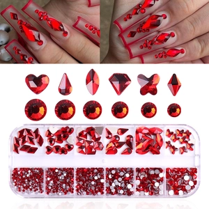 Red 12-grid nail art crystal set with assorted shapes and clear storage box