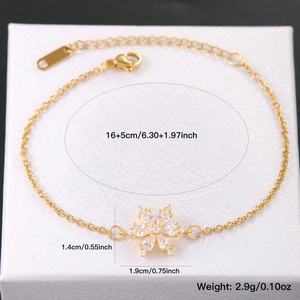 Bracciale dorato con pendente a fiore in zircone colorato e chiusura a moschettone