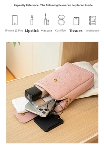Detailed view of pink PU leather crossbody bag with embossed patterns and gold zipper