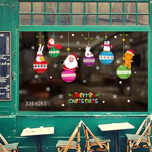 Détail de stickers de fenêtre Père Noël et animaux avec lettrage Joyeux Noël festif