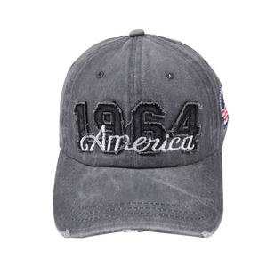 Detail of dark gray washed cotton baseball cap with 1964 embroidery and frayed brim