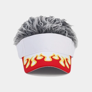Detailed embroidery of yellow flame pattern on a red visor with grey curly wig hair
