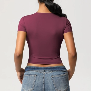Deep purple slim-fit yoga t-shirt with crew neck shown from a stylish back view