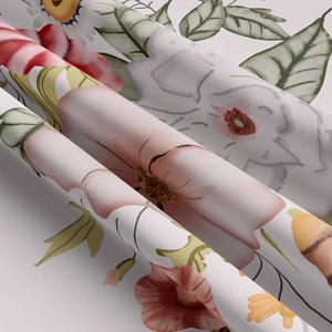 Close-up of floral print fabric with soft folds showing realistic flower patterns