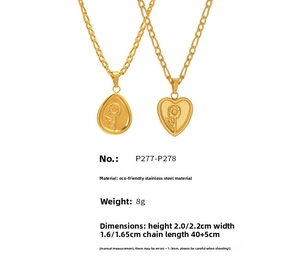 Detail of 18K gold plated stainless steel necklaces with heart and drop flower pendants