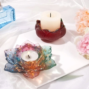 Lotus shaped resin candle holders in deep red and colorful gold foil flower design
