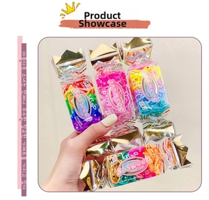 Close-up of colorful high-elastic hair ties in a creative crown-shaped candy gift box