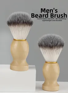 Close-up of shaving brush with wooden handle and dual-tone synthetic bristles
