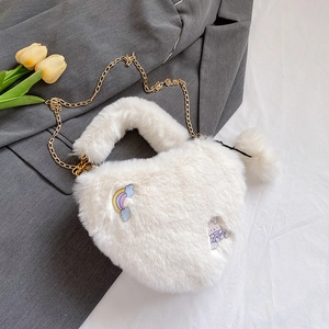 White heart-shaped faux fur crossbody bag with rainbow cloud and bunny embroidery details