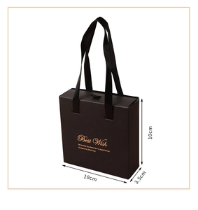 Matte black luxury gift bag with satin handles and gold Best Wish foil stamping