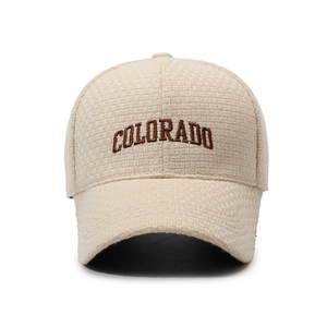 Beige waffle texture baseball cap featuring brown Colorado embroidery on the front