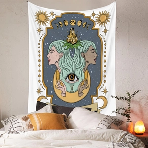 Astrology tapestry detail showing Gemini and celestial icons in a cozy bedroom setting
