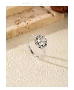 Detailed macro view of S925 sterling silver ring with hexagonal halo diamond setting
