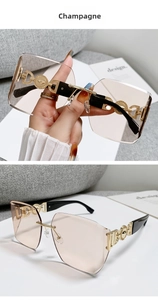 Detail of champagne gradient oversized rimless sunglasses with gold engraved metal temples