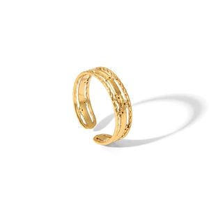 Detail of gold-toned triple-layered twisted texture on an adjustable open ring