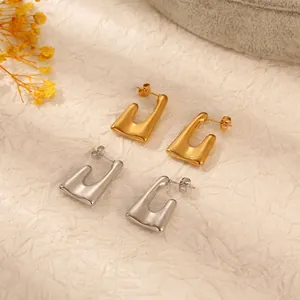 Minimalist irregular U-shaped hoop earrings in gold and silver finish for women