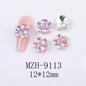 Macro detail of 12mm AB purple five-petal heart-shaped nail gems with flat metal back