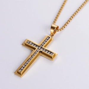 Polished gold stainless steel cross necklace with inset diamonds on a box chain