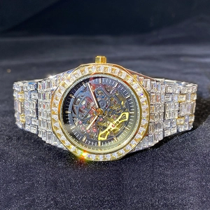 Close-up of hip hop mechanical watch with luxury iced out diamonds and skeleton dial