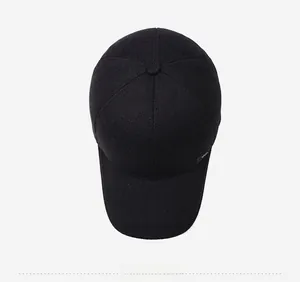 Overhead view showing the fine texture and SPORT logo of a black fleece baseball cap