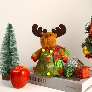 Detail of Christmas reindeer plush gift bag with Merry Christmas embroidery on skirt