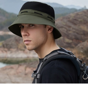Detailed view of breathable mesh panel and adjustable chin strap on olive outdoor sun hat