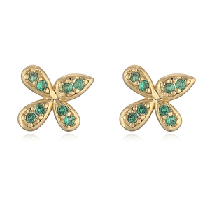 Detailed view of gold bow knot earrings featuring vibrant green crystal butterfly inlay