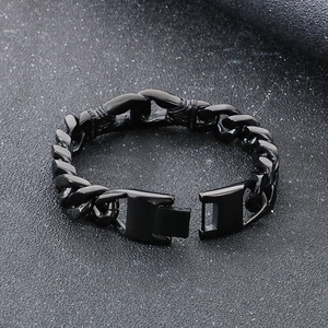 Macro shot of durable black metal chain bracelet with sturdy fold-over clasp design