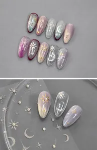 Nahaufnahme von 5D-geprägten Stern- und Mond-Nagelaufklebern mit Silberrelief-Textur