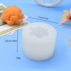 Silicone blooming lotus candle mold with orange finished product measuring 7x4.8cm