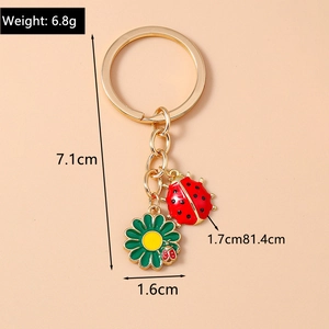 Detailed view of ladybug and daisy keychain dimensions with weight 6.8g specification