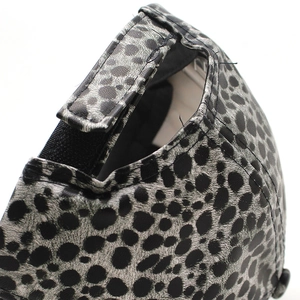 Close-up of leopard print PU leather baseball cap with adjustable velcro strap