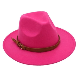 Detailed close-up of rose red wool fedora hat featuring a brown faux leather belt buckle