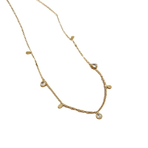 Gold titanium steel necklace featuring teardrop rhinestones and disc pendants