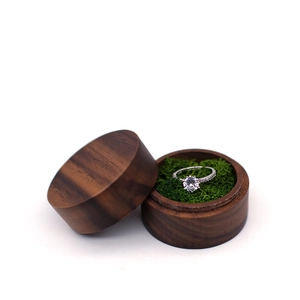 S925 silver ring with zircon in round walnut wood jewelry box with green moss