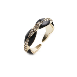 Detail view of gold-plated open ring with black enamel inlay and sparkling zircon pavé